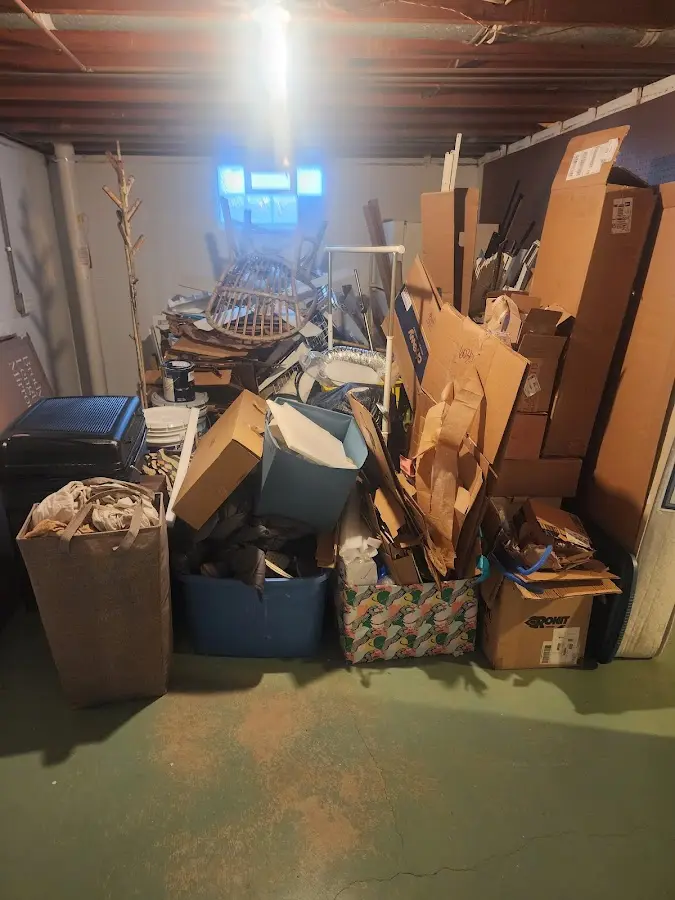 Roll-off dumpster container at job site for Yard Waste Dumpster Rental in Neptune